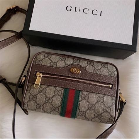 gucci that does not cost that much|least expensive Gucci item.